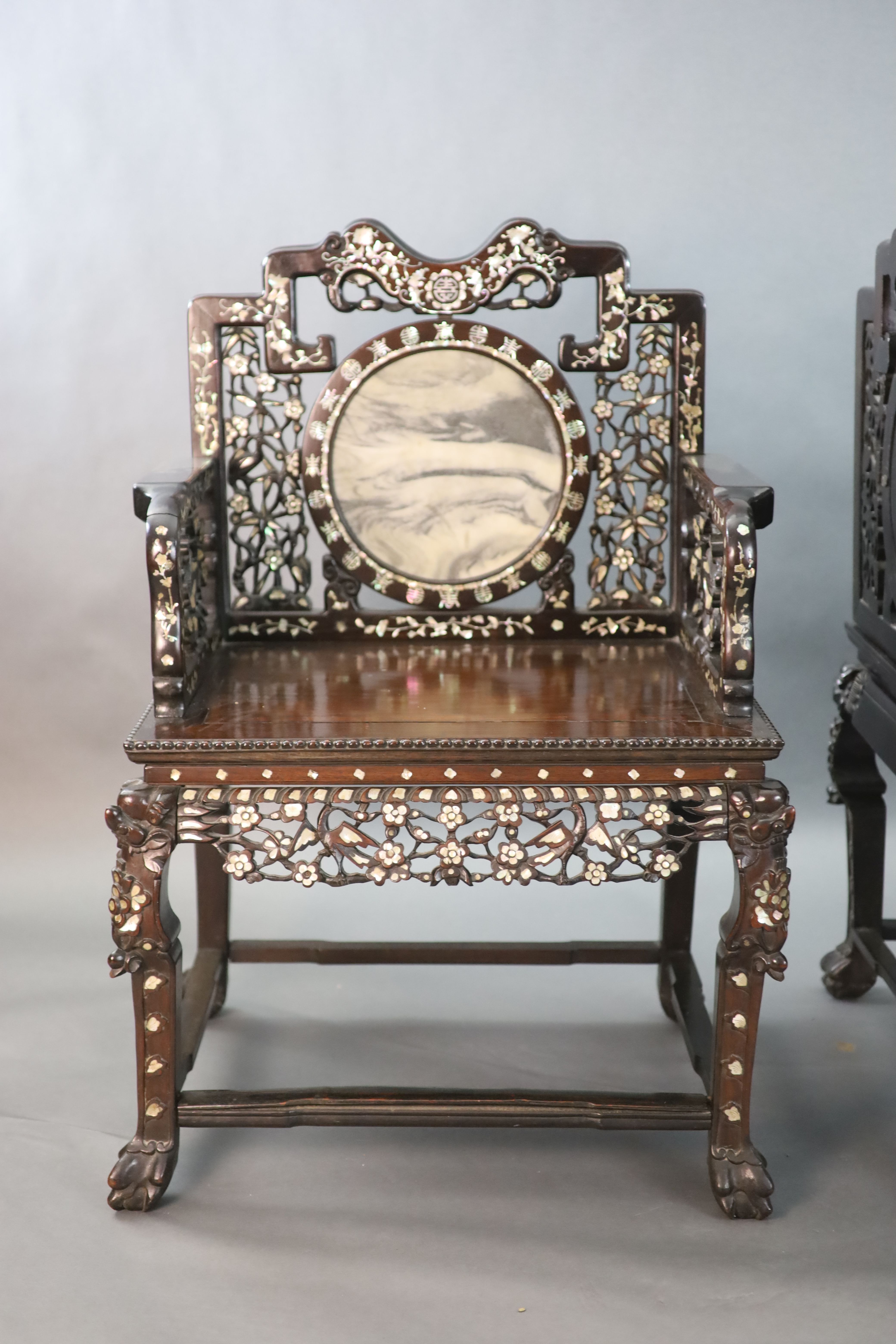 An impressive pair of Chinese hongmu and mother of pearl inlaid throne armchairs, c.1910, 70cm wide, 103cm high, Provenance - A. T. Arb